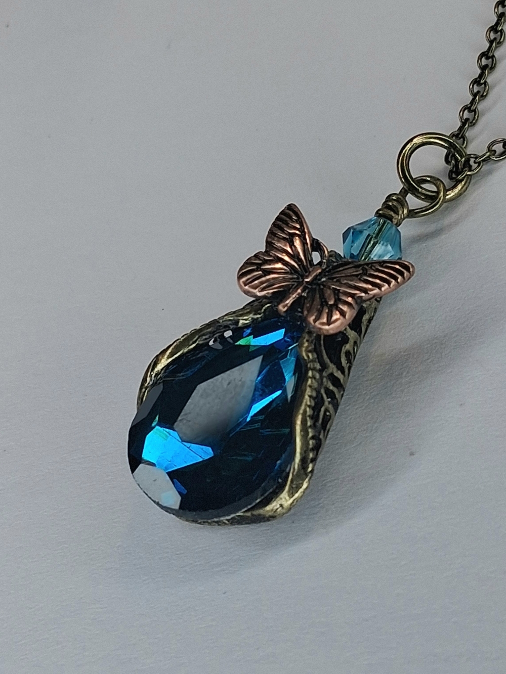 Blue Teardrop Crystal Butterfly Necklace Vintage Brass And Copper Tones
